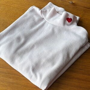 Pink Turtleneck with Heart Detail